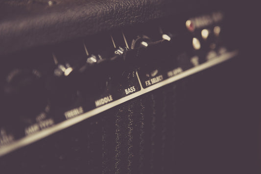 Voicing systems with amplified bass
